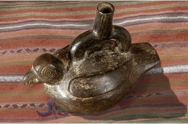 Black vessel that looks like a parrot