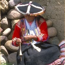 Woman spinning yarn