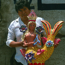 Artist with a ceramic mermaid