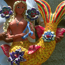 Detailed view of a ceramic mermaid