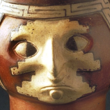 Deatailed view of a Wari jar depicting a face
