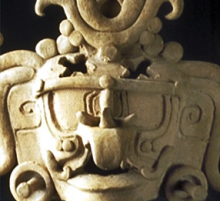 Detailed view of a ceramic bust of the Mayan sun god